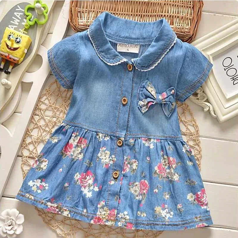 Baby Girls Denim Floral Dress Ages 12M–4T | Bow & Button Detail